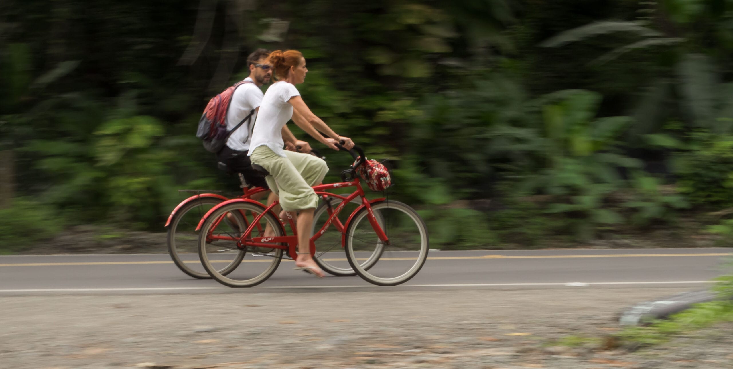 couple-riding-beach-cruiser-bicycles